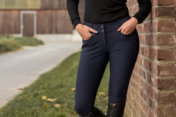 girls wearing Back on Track breeches for riders